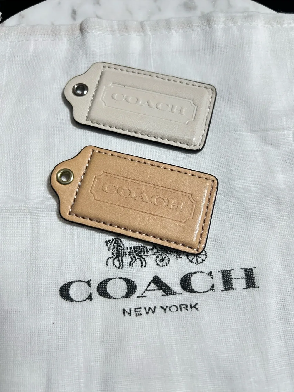 Coach Leather Bag Tags in Cream and Tan
